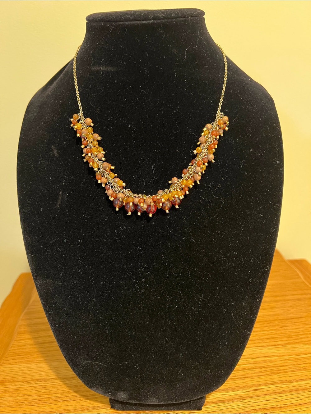 Gold-Tone Necklace with Amber and Brown Bead Cluster